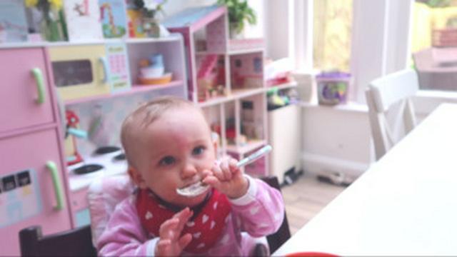 Baby learns to feed herself!