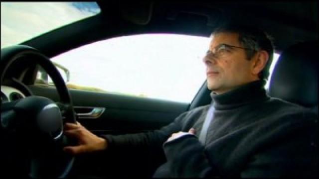 Rowan Atkinson and producer John Lloyd driving to Alnwick Castle