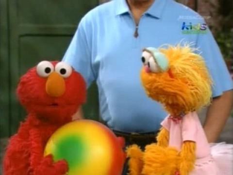 Elmo and Zoe Claim a Ball