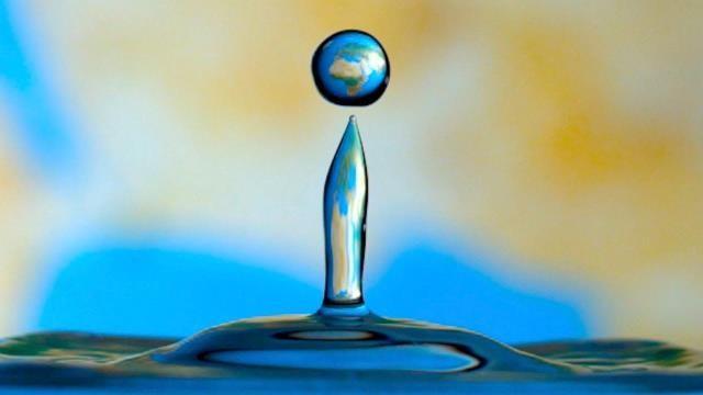 The Earth Inside a Macro Water Droplet