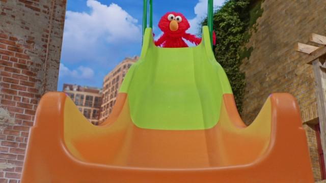 Elmo Goes Down the Big Slide