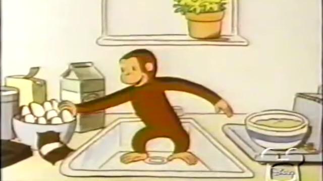 Curious George Bakes a Cake