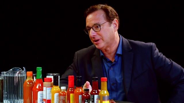 Bob Saget Hiccups Uncontrollably While Eating Spicy Wings