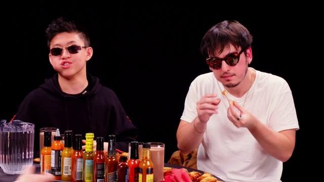 Joji and Rich Brian Play the Newlywed Game While Eating Spicy Wings