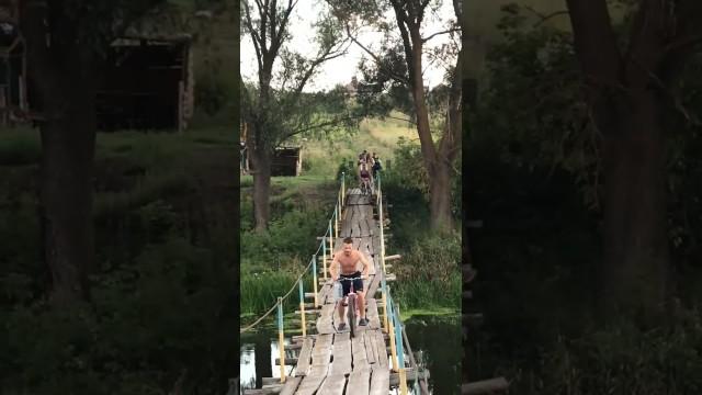 Guy Faceplants on a Bridge