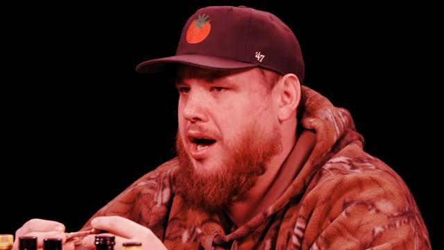 Luke Combs Feels a Heat Hurricane While Eating Spicy Wings
